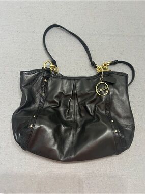 Coach Black Leather Shoulder Bag with Gold-Tone Charm